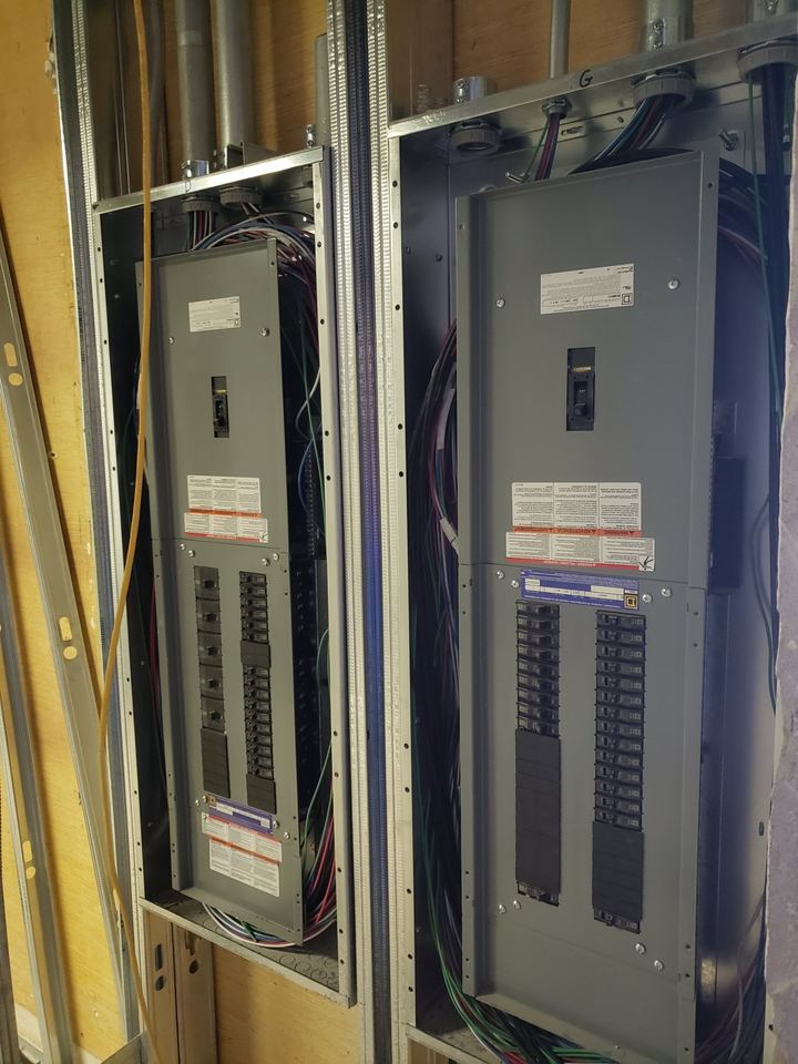 Two new electrical panels installed side by side