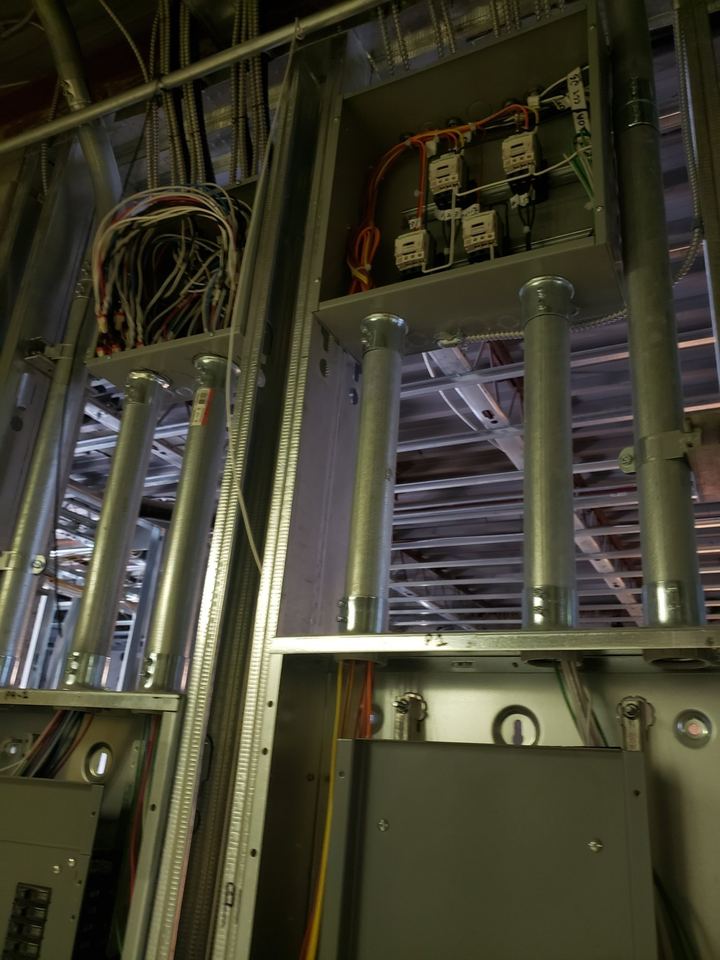 Panels and conduit in a building under construction