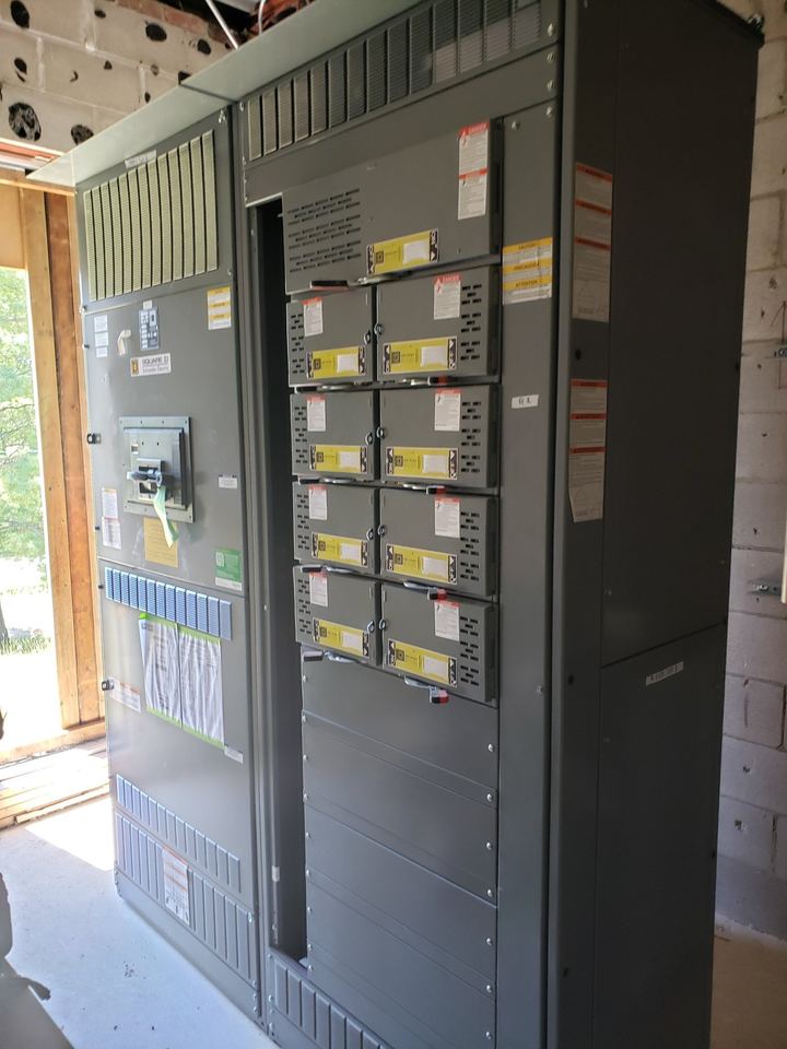 Bank of commercial meters and breaker panels