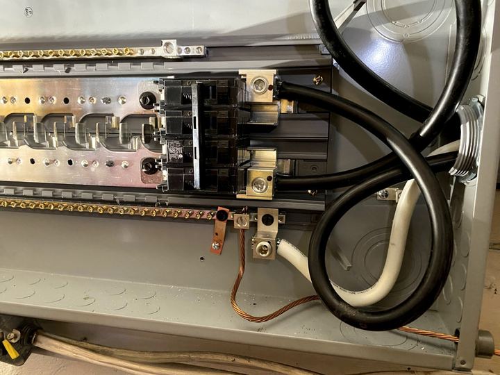 Heavy service conductors in a panel