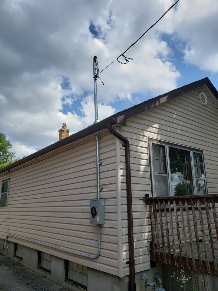House exterior with a new service mast